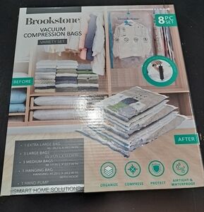 NIB Brookstone 8 Piece Set.   Vacuum Compression Bags Variety Set W/Hand Pump